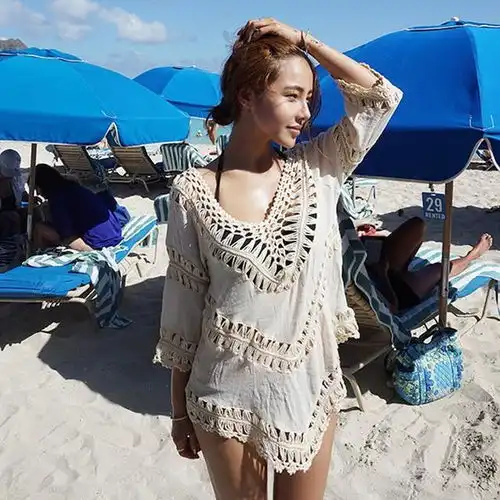 海边打造清新性感,只需一件别致的泳衣罩衫