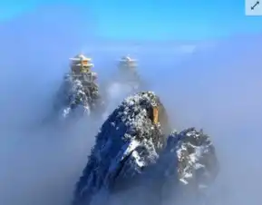 老君山现云海奇观银装素裹绝壁道观似琼楼玉宇